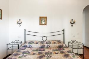 Postel nebo postele na pokoji v ubytování Villa Collina dei Pini