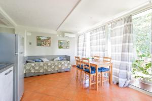 Kuchyň nebo kuchyňský kout v ubytování Villa Collina dei Pini