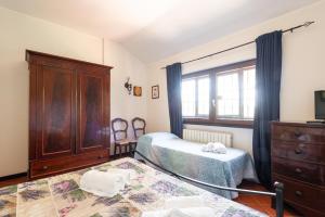 Postel nebo postele na pokoji v ubytování Villa Collina dei Pini