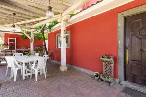 Patio nebo venkovní prostory v ubytování Villa Collina dei Pini