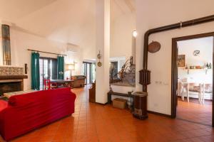 Posezení v ubytování Villa Collina dei Pini + 37 fotografií