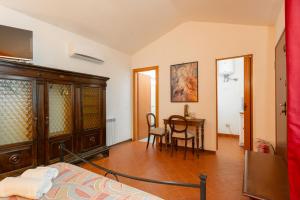 Postel nebo postele na pokoji v ubytování Villa Collina dei Pini