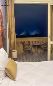 Postel nebo postele na pokoji v ubytování Moon Pyramids Inn