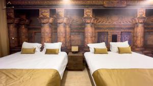 Postel nebo postele na pokoji v ubytování Moon Pyramids Inn