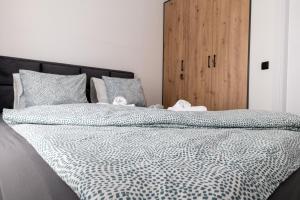 Ένα ή περισσότερα κρεβάτια σε δωμάτιο στο Belgrade Apartment Nook