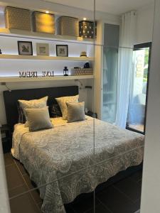 Ένα ή περισσότερα κρεβάτια σε δωμάτιο στο ADO HOUSE Albufeira +16 φωτογραφίες