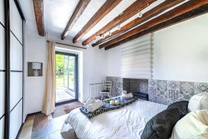 Posezení v ubytování Ancien Corps de Ferme Jardin Jacuzzi 30 min Paris