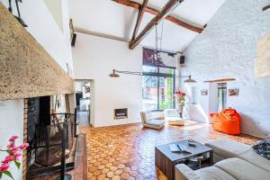 Posezení v ubytování Ancien Corps de Ferme Jardin Jacuzzi 30 min Paris