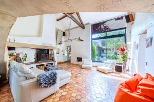 Posezení v ubytování Ancien Corps de Ferme Jardin Jacuzzi 30 min Paris