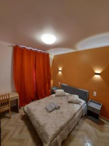 Postel nebo postele na pokoji v ubytování Ardenn'Hotel