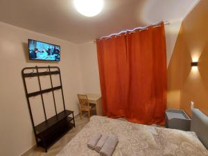 Postel nebo postele na pokoji v ubytování Ardenn'Hotel