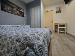 Postel nebo postele na pokoji v ubytování Ardenn'Hotel