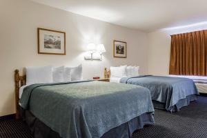 Postel nebo postele na pokoji v ubytování Quality Inn & Suites Goldendale