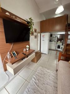 Køkken eller tekøkken på Loft Menor Aconchegante com Ar-Condicionado + 8 billeder