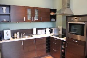 Kuchyňa alebo kuchynka v ubytovaní Luksusowy Apartament Sopot II + 8 fotografií