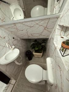 Et badeværelse på Loft Menor Aconchegante com Ar-Condicionado