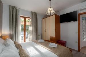 Ένα ή περισσότερα κρεβάτια σε δωμάτιο στο Apartment Vrsar 17473b