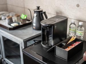 مطبخ أو مطبخ صغير في Machiya Hotel oyado baison