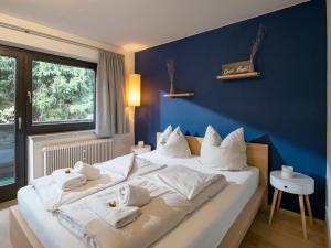 Postel nebo postele na pokoji v ubytování Appartement Herliana by NV-Appartements