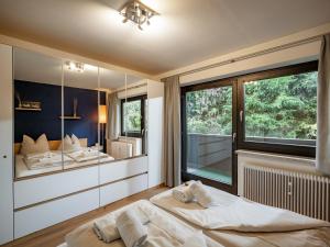 Postel nebo postele na pokoji v ubytování Appartement Herliana by NV-Appartements