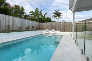 Kolam renang di atau dekat dengan Tranquil Whitehaven Retreat in Mooloolaba