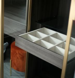 A bed or beds in a room at プラフィーノリゾートヴィラ
