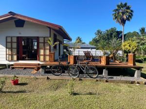 Zahrada ubytování Fare lei , bungalow en toute simplicité + 9 fotografií