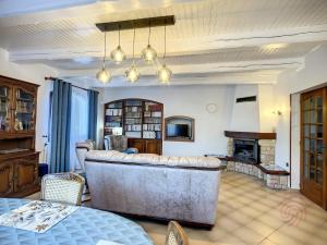 Posedenie v ubytovaní Maison F4 avec terrasse, parking et animaux acceptés - FR-1-451-185