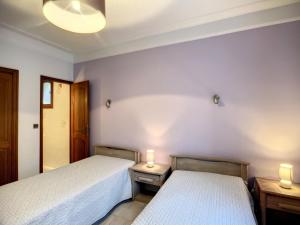 Posteľ alebo postele v izbe v ubytovaní Maison F4 avec terrasse, parking et animaux acceptés - FR-1-451-185