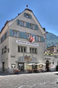 a large building on the side of a street at Zunfthaus zur Rebleuten in Chur