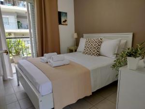 Postel nebo postele na pokoji v ubytování Kula Kula - Welcome stay House in Chalkidiki