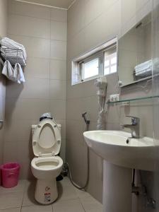 Koupelna v ubytování Niuge Minsu Homestay + 15 fotografií