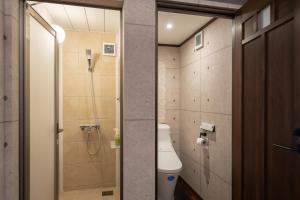 حمام في Machiya Hotel oyado baison