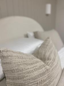 HOME ByCoastalRoad客房内的一张或多张床位