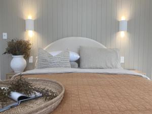 HOME ByCoastalRoad客房内的一张或多张床位