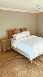 HOME ByCoastalRoad客房内的一张或多张床位