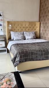 מיטה או מיטות בחדר ב-JAVA Hostel Tumpak Sewu