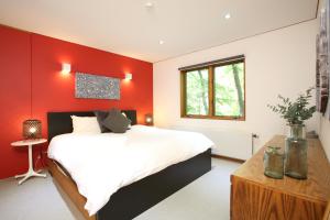 Ένα ή περισσότερα κρεβάτια σε δωμάτιο στο Jumoku