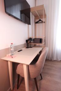 Kuchyň nebo kuchyňský kout v ubytování Rosa Hotel