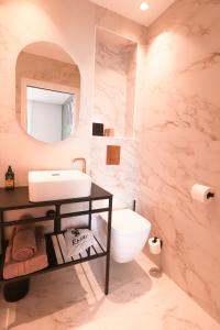 Koupelna v ubytování Rosa Hotel