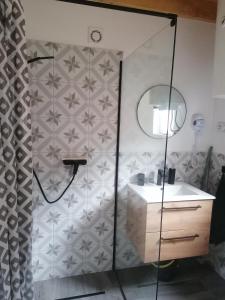 a bathroom with a shower and a sink at Lisi Zakątek in Czarna +40 photos