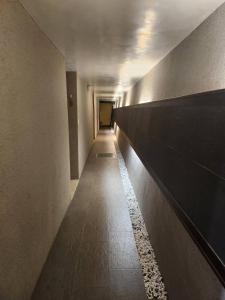 a long hallway with a long corridor at Sun Fog Hotel in Yuchi