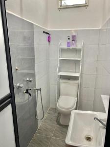 Koupelna v ubytování Tulip's Homestay Kuala Berang-FREE WIFI + 15 fotografií