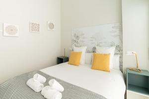 Postel nebo postele na pokoji v ubytování Bright and Airy 2 Bedroom Apartment in Madrid