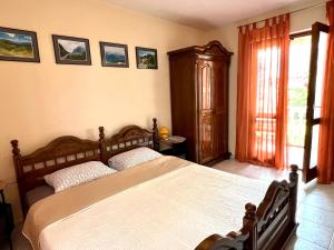 Letto o letti in una camera di Villa Dionis