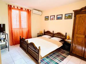 Letto o letti in una camera di Villa Dionis