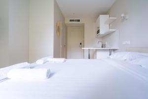 Posteľ alebo postele v izbe v ubytovaní Relaxing Studio Apartment in the Heart of Paris
