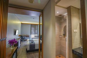 Ένα μπάνιο στο BATIQA Hotel Palembang