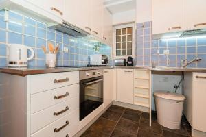 Η κουζίνα ή μικρή κουζίνα στο Wonderful Apartment in the Historial Center of Lisbon