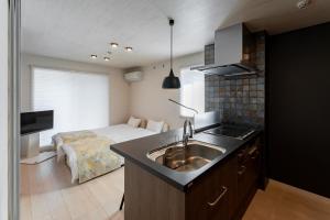 Dapur atau dapur kecil di リブレ芳斉 #203